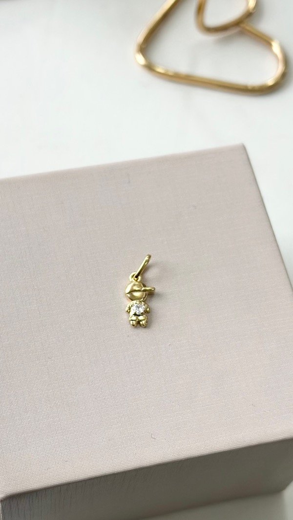 Producto - Dije niño con punto de luz laminado en oro 18k