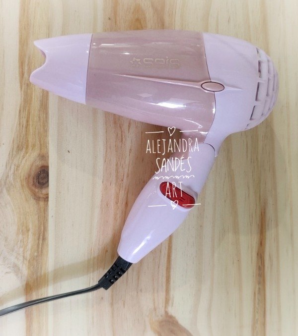 Producto - Secador de pelo mini color rosa