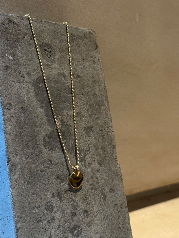 Producto - Numa con dije