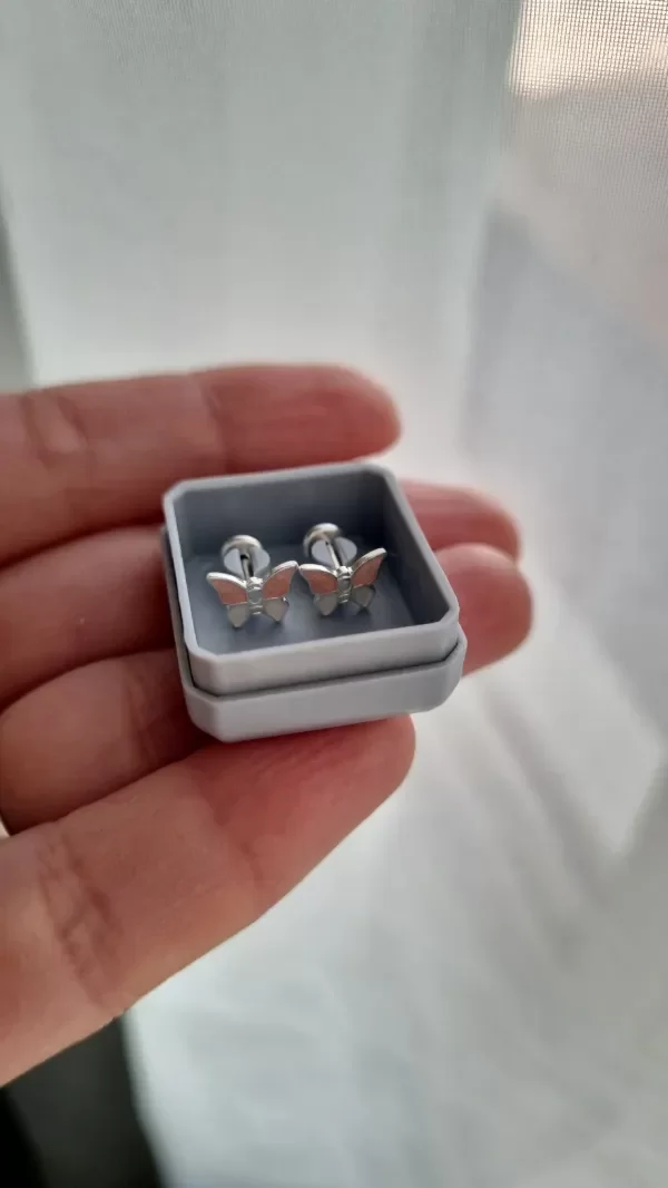 Producto - Abridores mariposas combinadas con naranja esmaltado plata 925