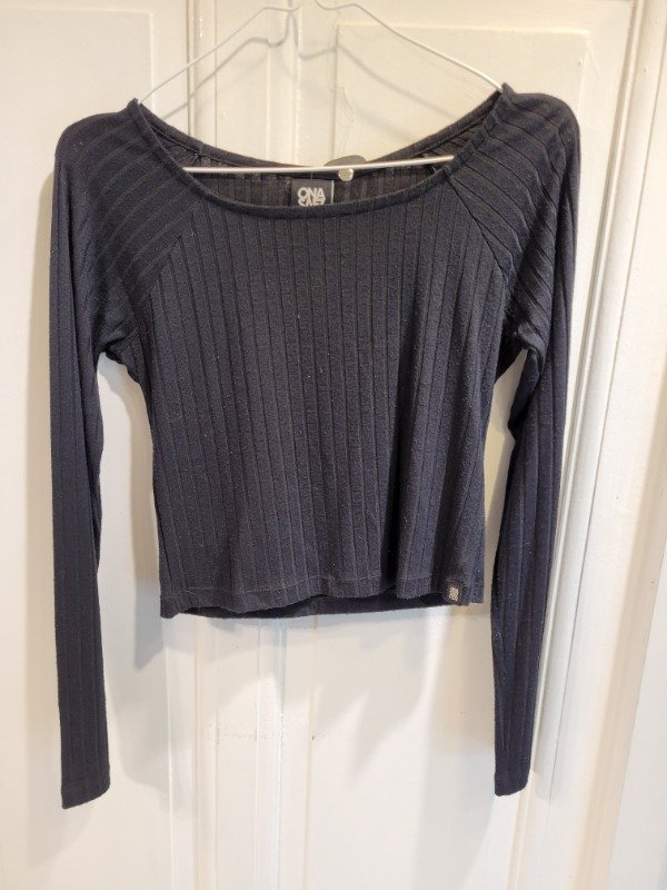 Producto - Remera ONA SAEZ negra de morley Talle S - PRECIO: 18X