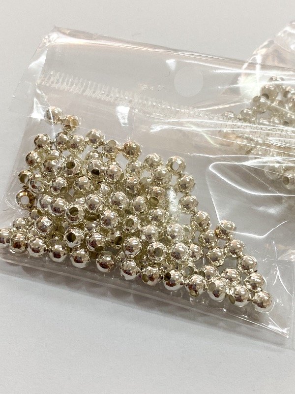Producto - Bolitas de metal blanco 4 mm