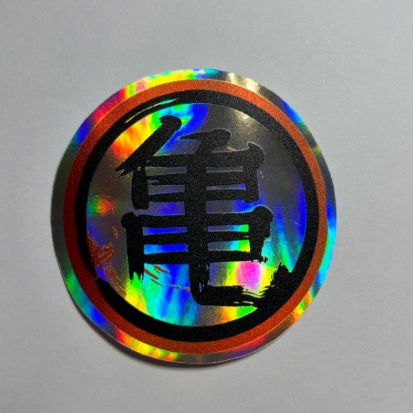 Producto - Emblema maestro Roshi tornasolado