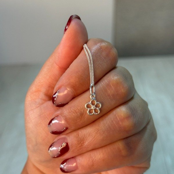 Producto - DIJE PLATA 925 MARGARITA CALADA