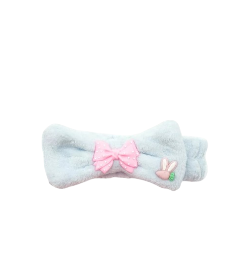 Producto - Vincha de skincare con moño y aplique de silicona Mely