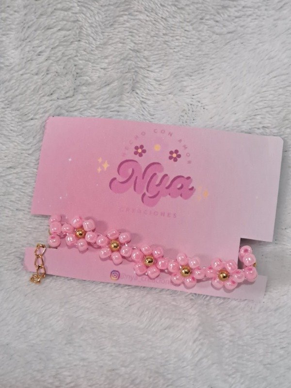 Producto - pulsera de flores rosa