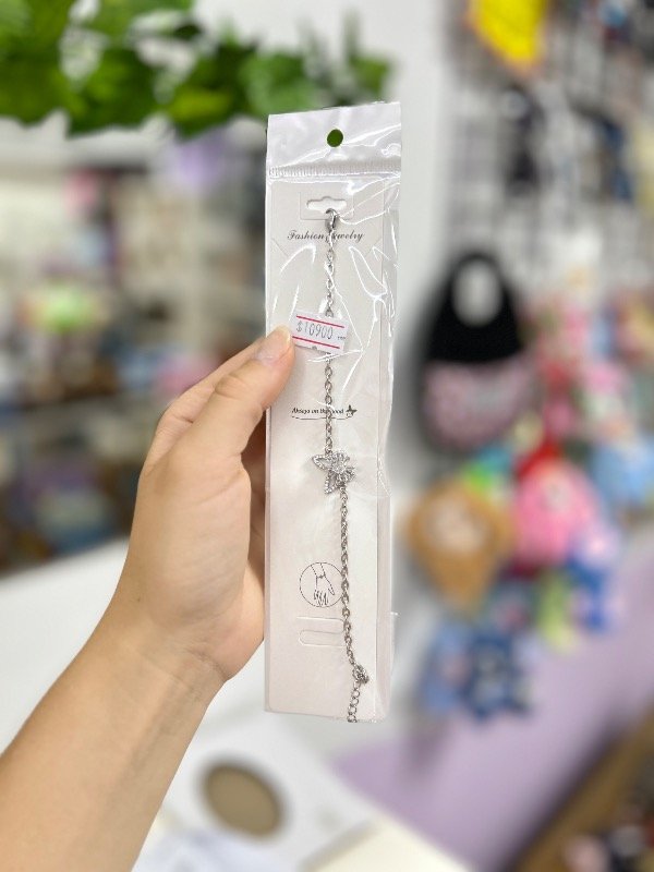 Producto - Pulcera dije mariposa giratorio