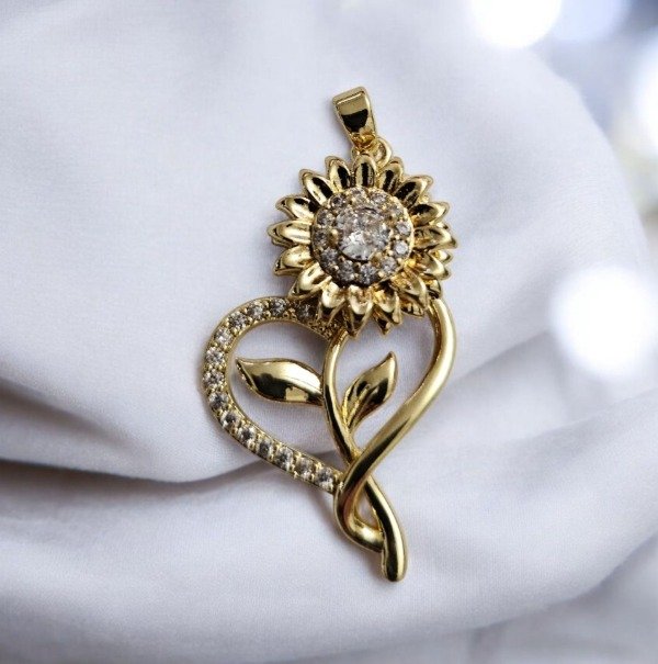 Producto - Dije giratorio girasol dorado