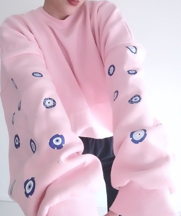 Producto - Buzo boxy OJITOS PROTECTORES AZULES rosa bebe
