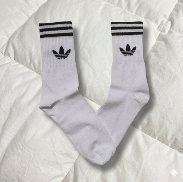Adidas blanca raya negra