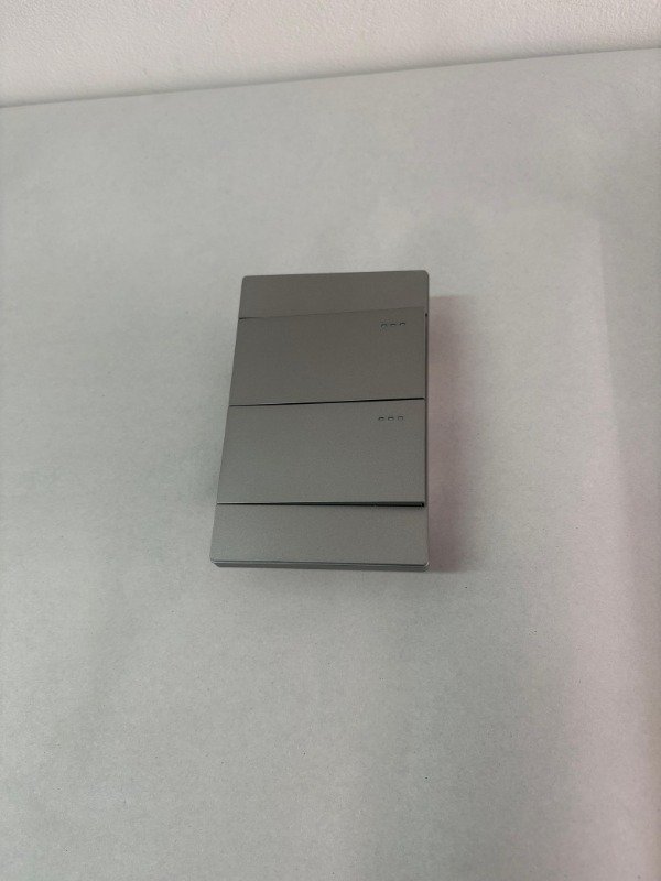 Producto - Tecla Doble Teclón 2 Canales Gris 16a Voltaje Nominal 250v Color Gris