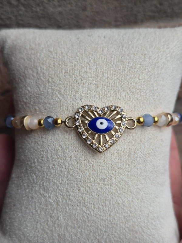 Producto - Pulsera -cristales corazon con rayitas y ojo turco