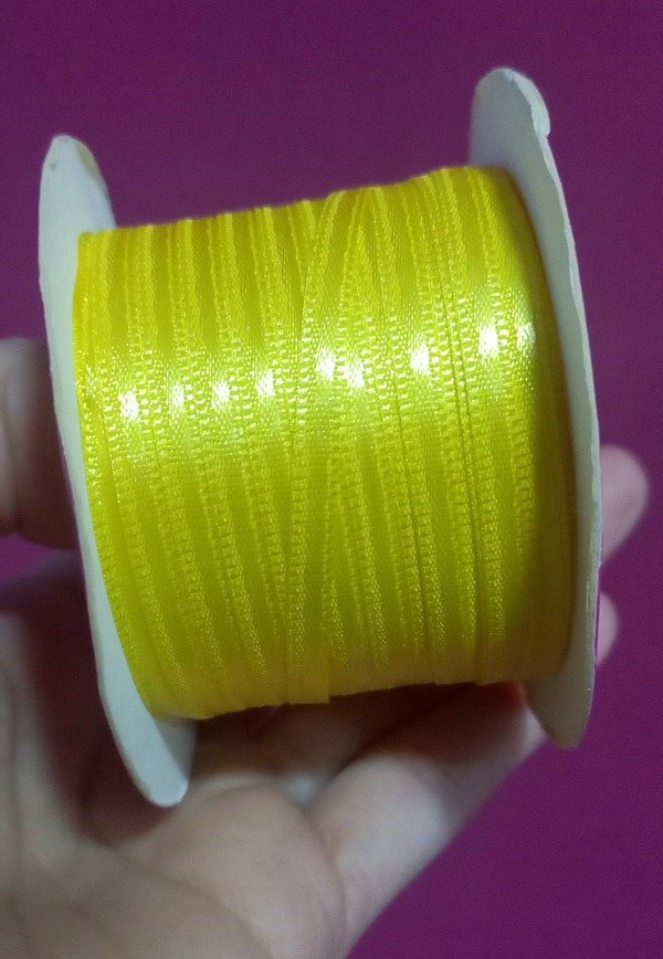 Producto - REMANENTE CINTA DE RASO NÚMERO 0 COLOR AMARILLO PATITO X 31 METROS
