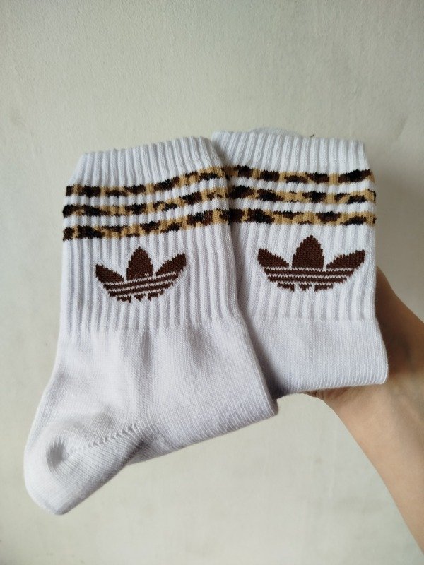 Producto - Tenis adi rayas animal print logo