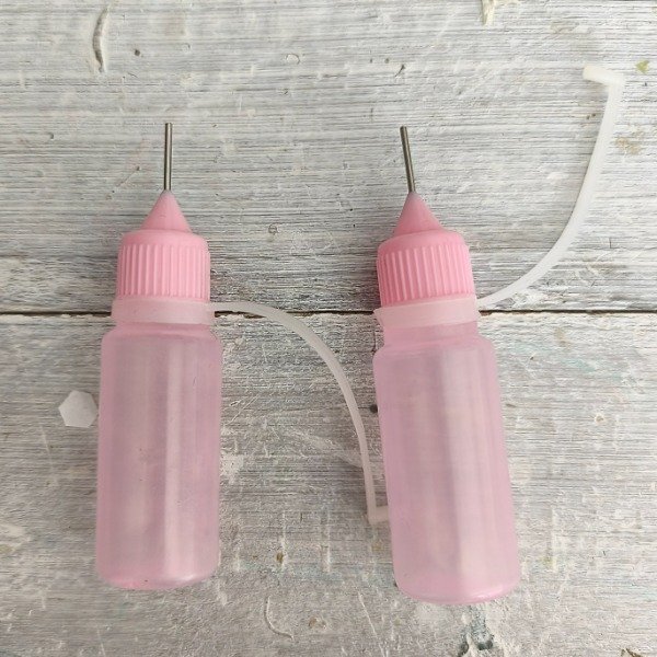 Producto - Botellas punta aguja rosa