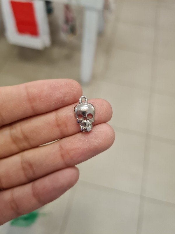 Producto - DIJE PLATEADO CALAVERA