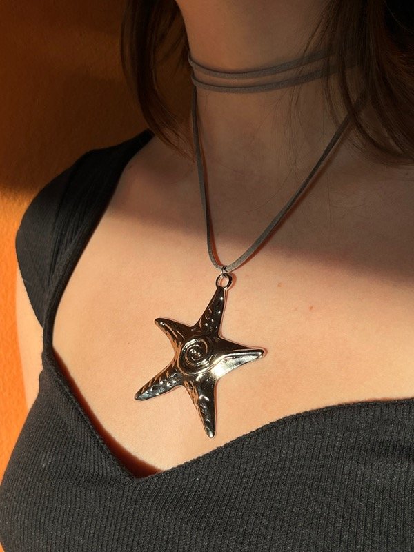 Producto - dije estrella espiral