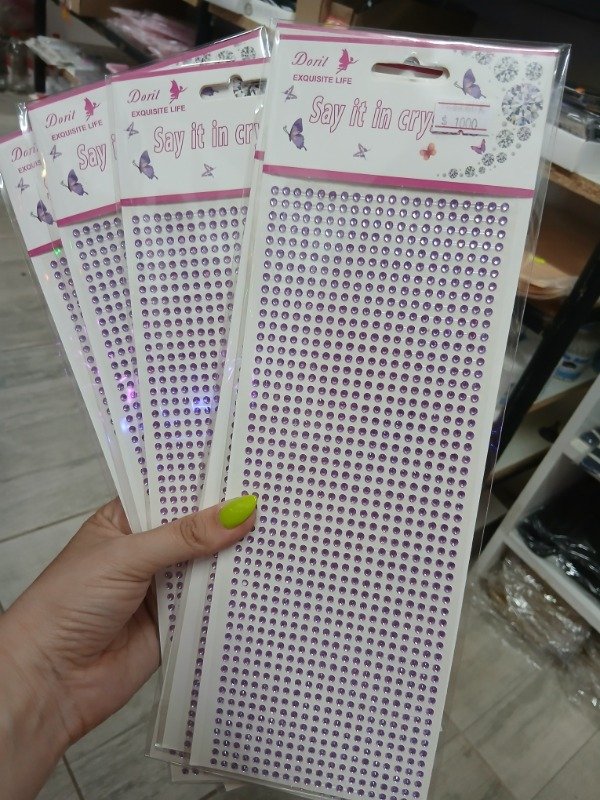 Producto - Stras lila chico rostro dorit