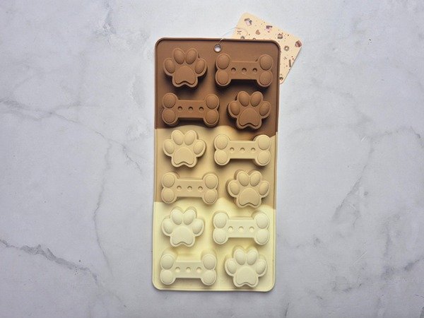 Producto - HUELLITA TRICOLOR