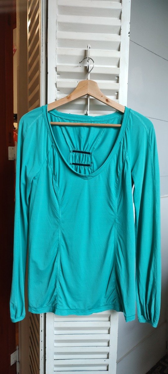 Producto - Remera deportiva turquesa, talle M