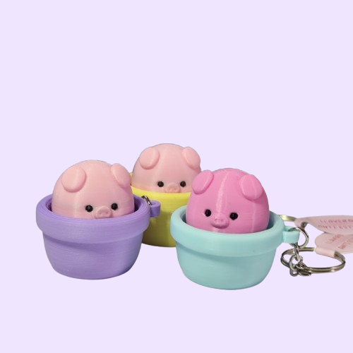 Producto - CLICKER CERDITO MACETA
