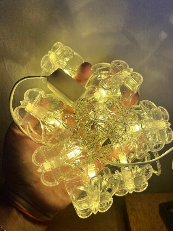 Producto - Lucecitas mariposa broche con entuchufe