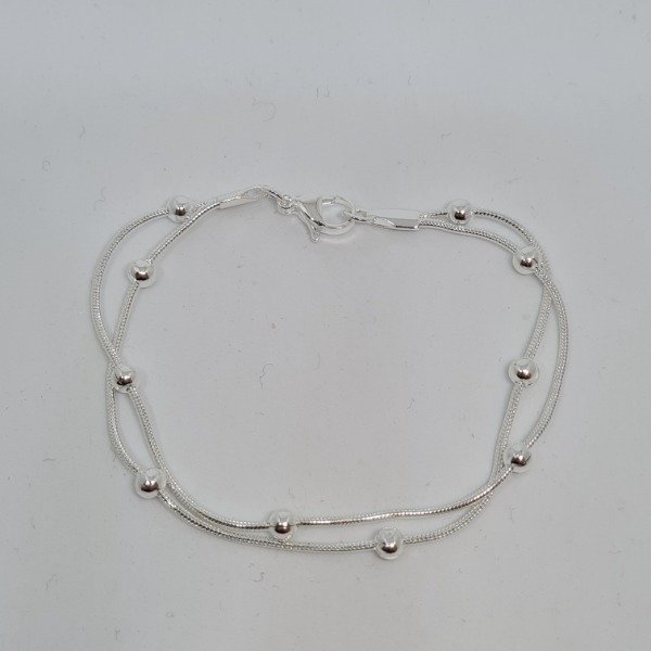 Producto - Pulsera claplaton c/bolas dos hileras