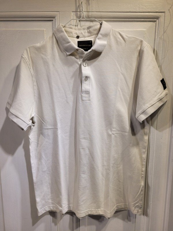 Producto - Chomba KEVINGSTON blanca lisa Talle S - PRECIO: 23X