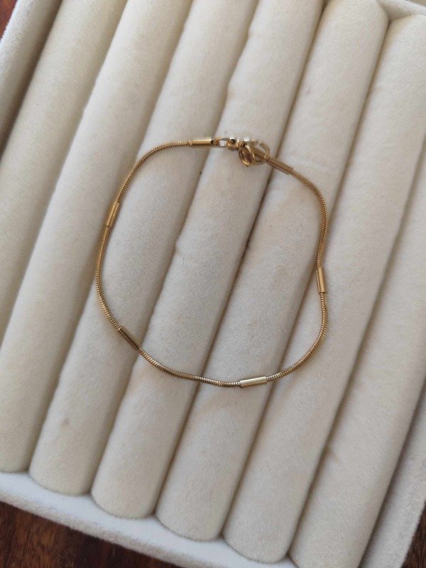 Producto - Pulsera cola de ratón detalle chato. Acero dorado.