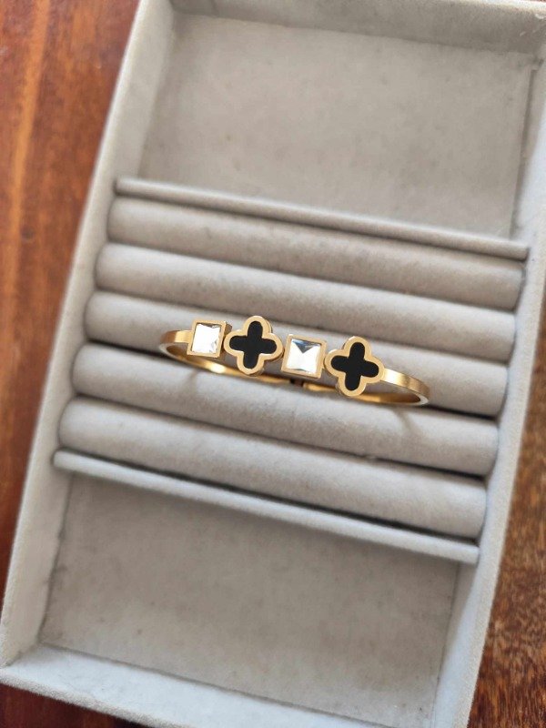 Producto - Esclava trébol . Bicolor. Acero dorado