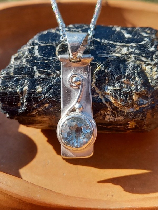 Producto - Topacio dije en plata con movimiento - 0