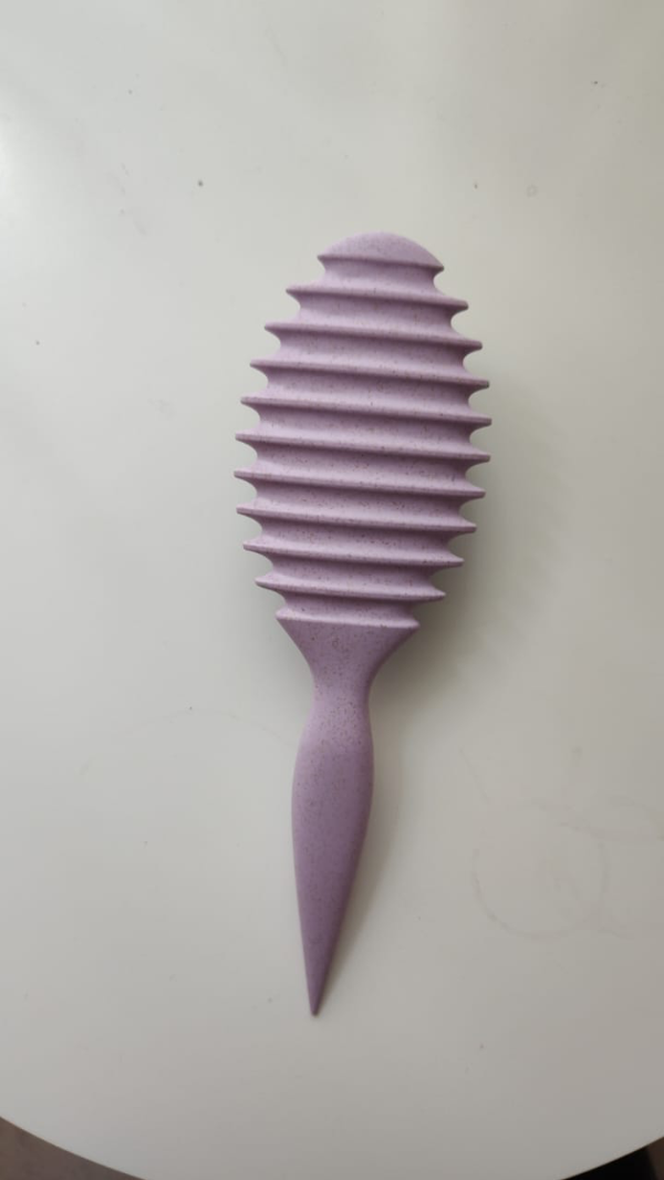 Producto - cepillo viral para cabellos rizados