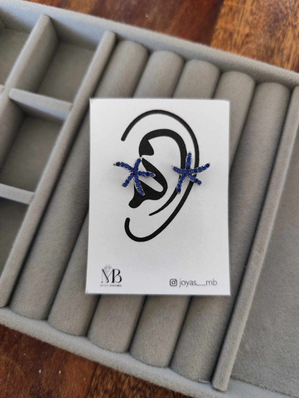 Producto - Aros estrella pasante strass azul. Acero quirúrgico.