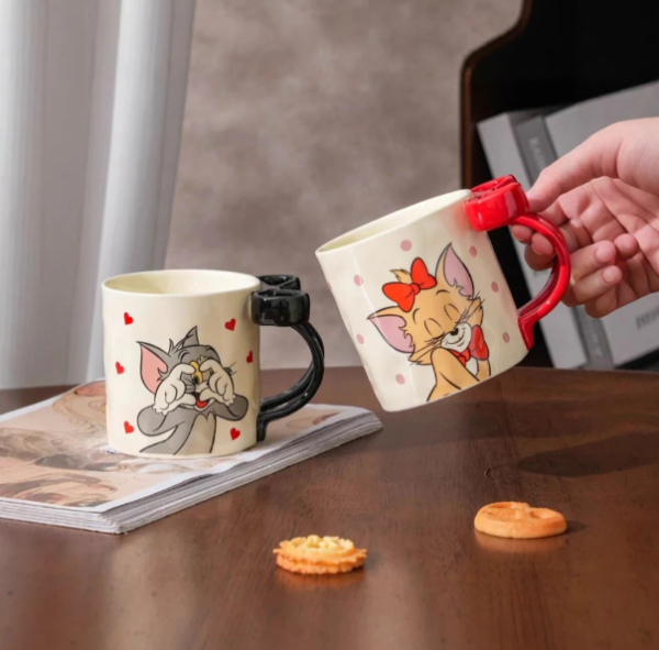 Producto - Taza importada Tom y Jerry con moño