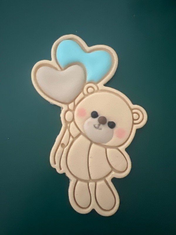 Producto - Osito con corazones  12cm celeste