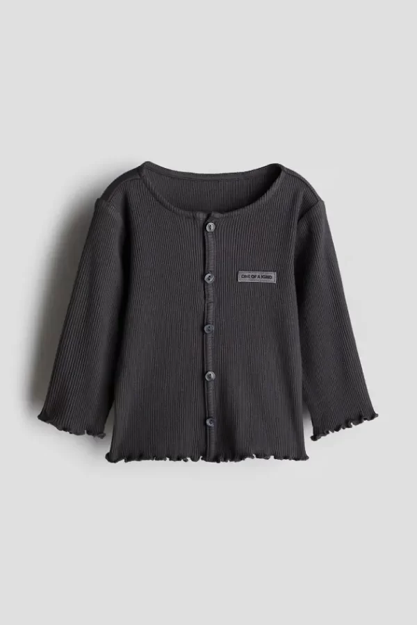 Producto - Remera HyM con botones en canale negra - 0