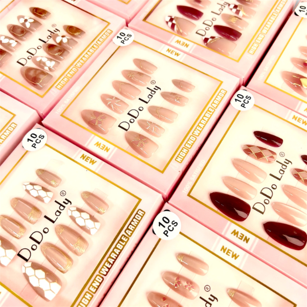 Producto - Uñas postizas press on ojo de gato nude y rojas Dodo Lady