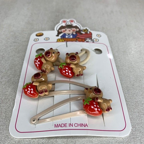 Producto - Pack broches y colitas de capibara II