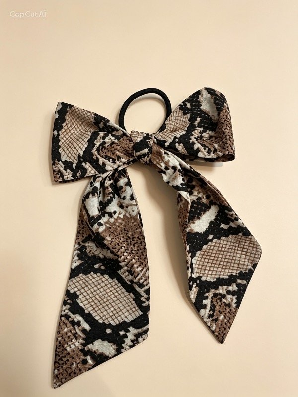 Producto - Moño snake camel