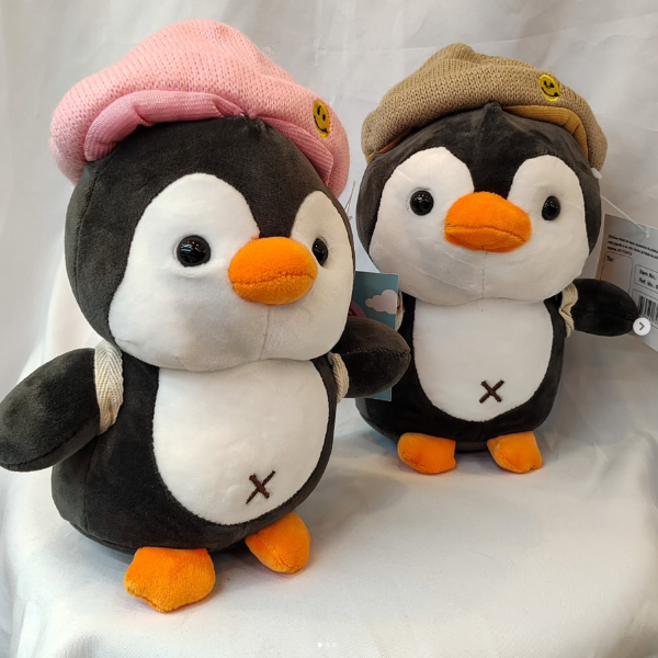 Producto - Peluche Pinguino con gorro y mochila 20cm