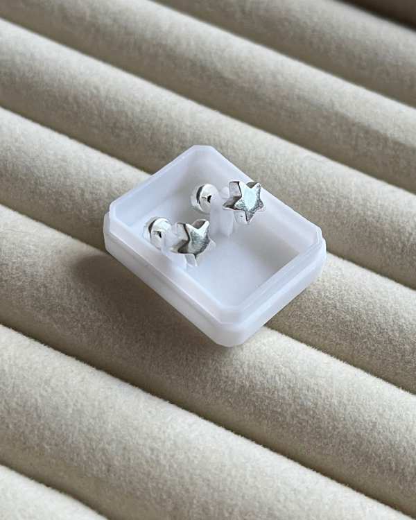 Producto - Aros abridores estrellas infladas de acero blanco 6mmd