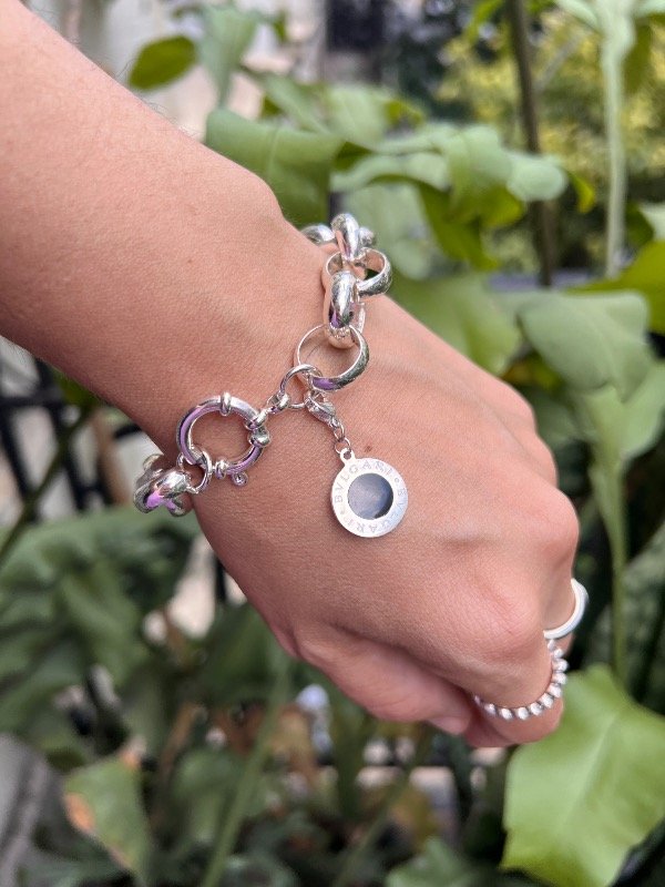 Producto - Pulsera rolo de acero blanco con cierre marinero y dije