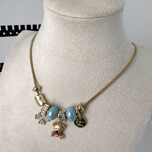 Producto - Collar Dorado Goth -  Dupe Pandora -Osito con moño rojo