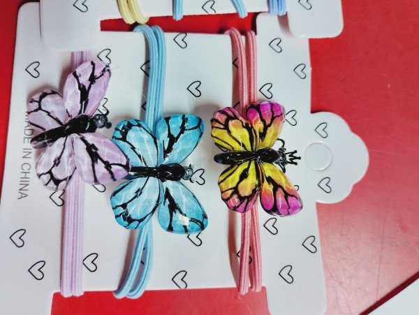 Producto - Colita mariposa x 3