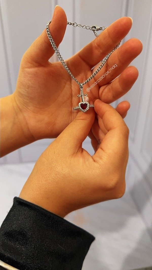 Producto - Pulsera y anillo espada y corazones