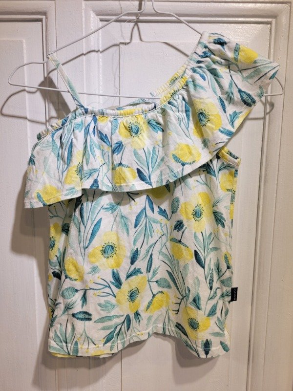 Producto - Musculosa MIMO blanca con flores amarillas Talle 10 años - PRECIO: 10X