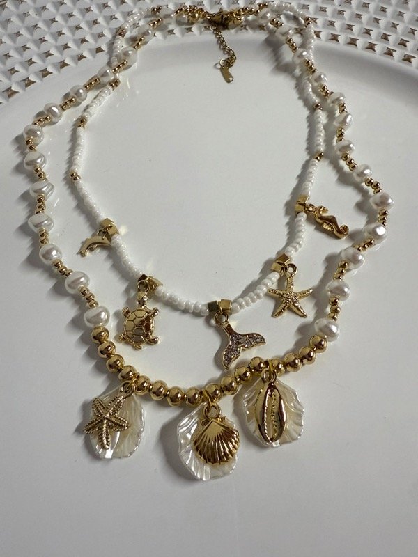 Producto - CD147 Collar doble multidijes acero dorado y perlas