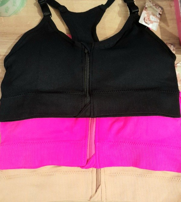 Producto - Top deportivo liso con cierre y tiras regulable - 1