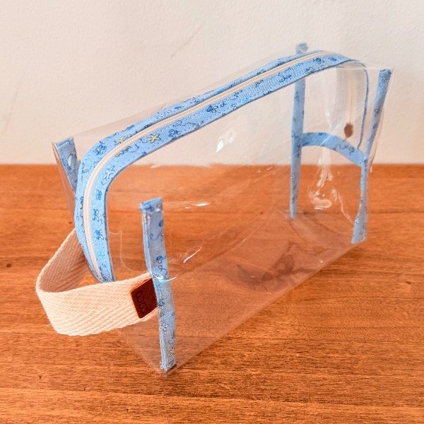 Producto - NECESER SOFI Dibujos en Celeste