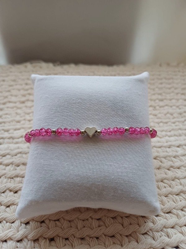 Producto - Pulsera cristal de roca con dije corazón rosas